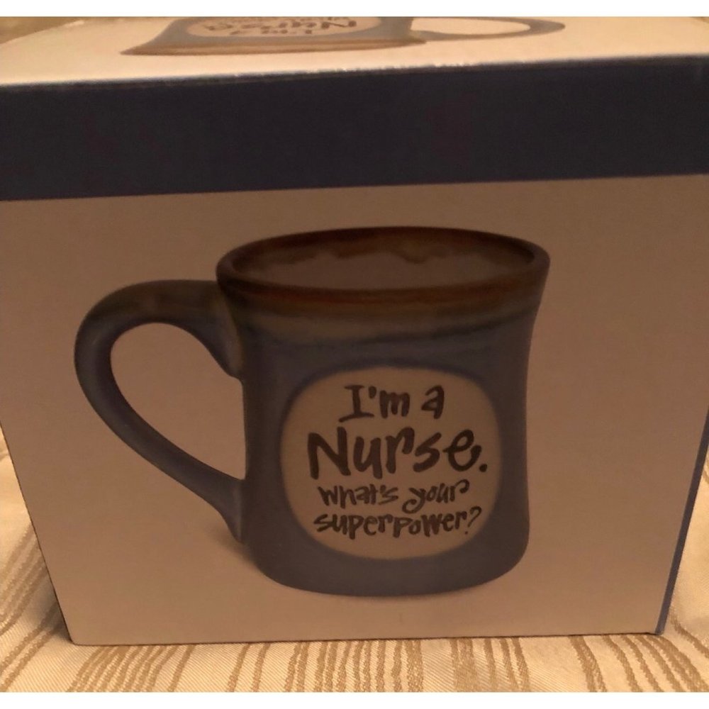Burton + BURTON "I'm A Nurse What's Your Superpower?"  Cup By Joanne Sharpe
